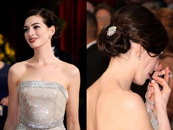 点击大图看下一张：低髻花苞头，示范明星：Anne Hathaway，如果你的脸型是标准的鹅蛋脸和小V脸，那么你可以选择低髻花苞头哦！再配上一个长耳环，简直美呆了！