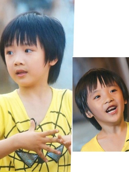 点击大图看下一张：吴费曼发型，不规则的齐刘海与鬓角修饰脸型，是属于可爱的正太型的男孩发型。