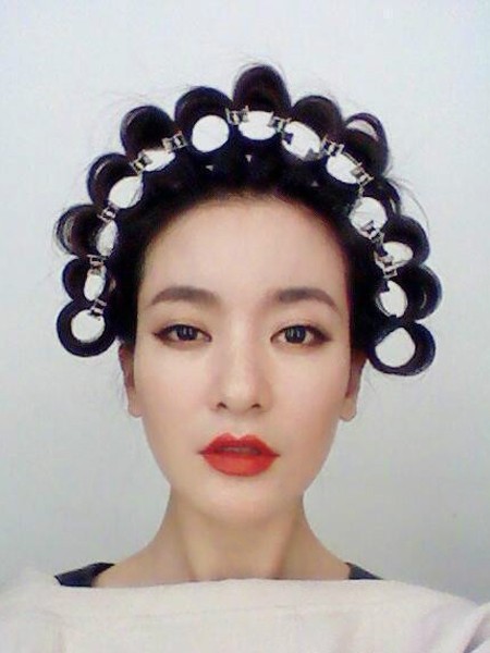 点击大图看下一张:李晟晒包租婆造型还算“靠谱”?