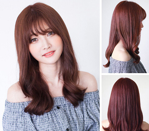 点击大图看下一张：韩国妹子流行发型5：空气刘海是韩剧女主们经常出现的造型，搭配铜棕色中长卷发瞬间提升甜美度。