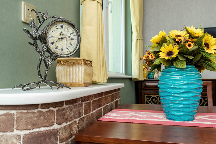 点击大图看下一张:现代田园风格三居室客厅装修效果图