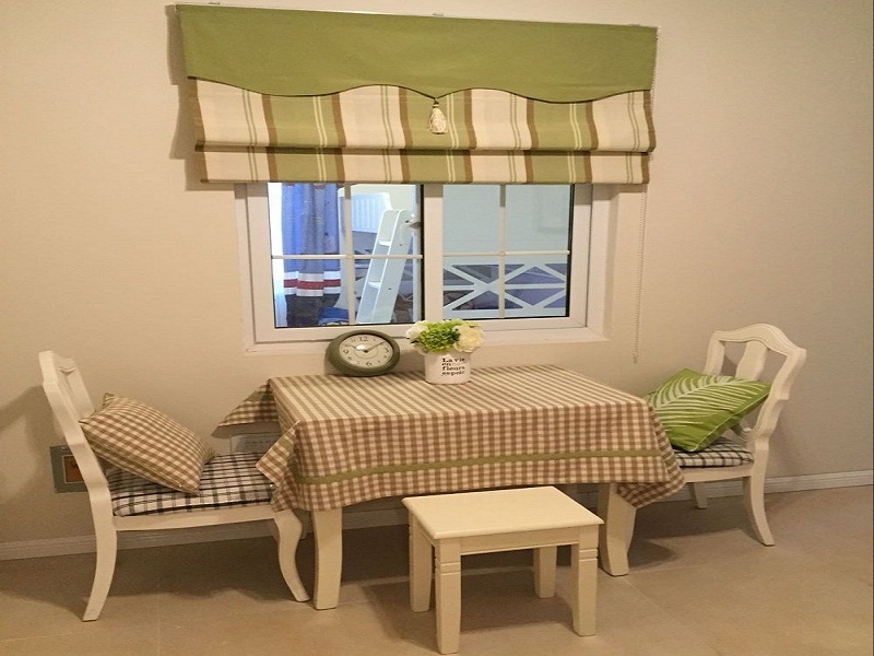 点击大图看下一张：温润清新田园二居室别致装潢