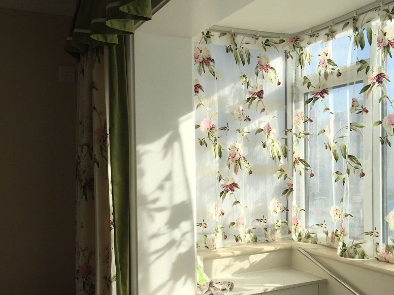 点击大图看下一张：温润清新田园二居室别致装潢