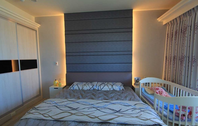 点击大图看下一张：童趣简约三居室装潢设计