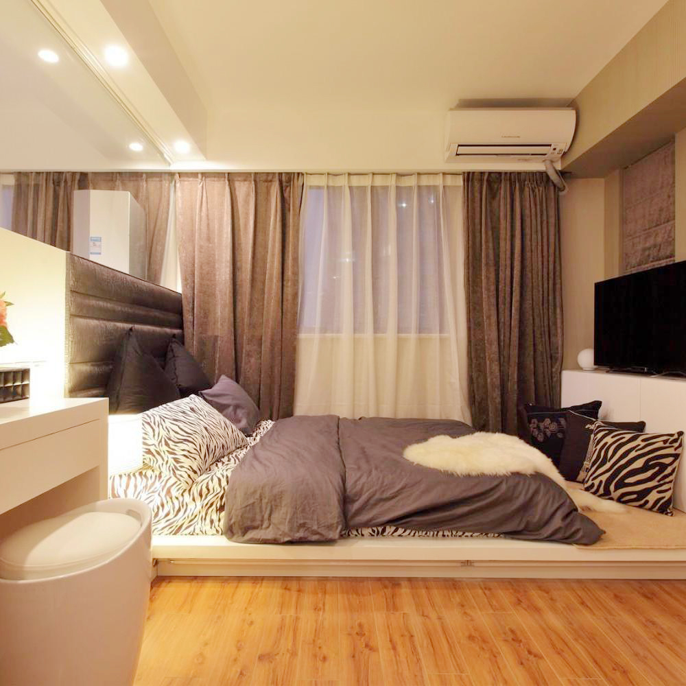 点击大图看下一张:现代简约二居装潢效果图