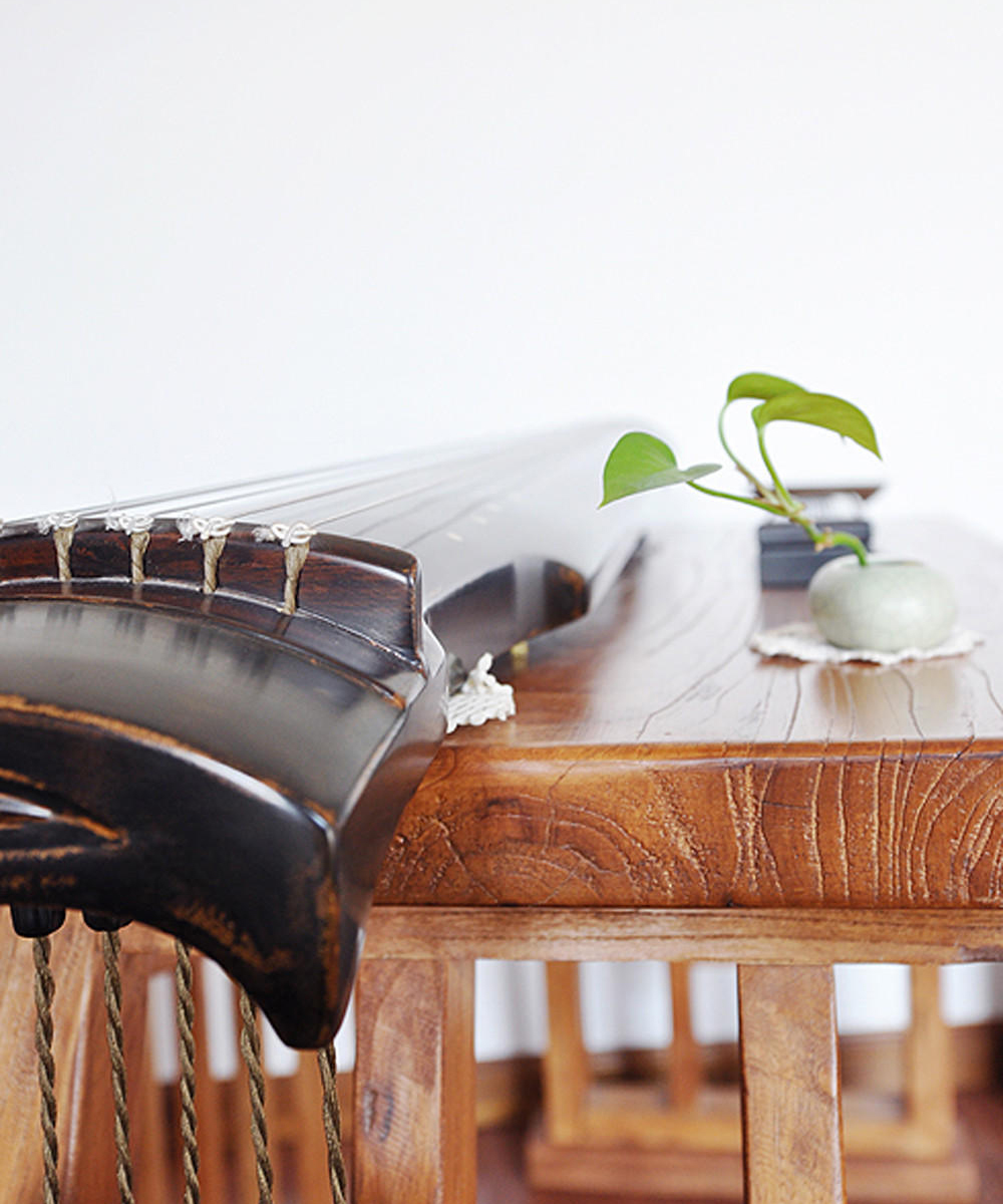 点击大图看下一张：雅致中式四居装饰大全