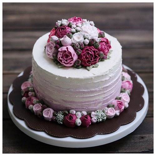 点击大图看下一张：花朵蛋糕图片 两个蛋糕和花朵
