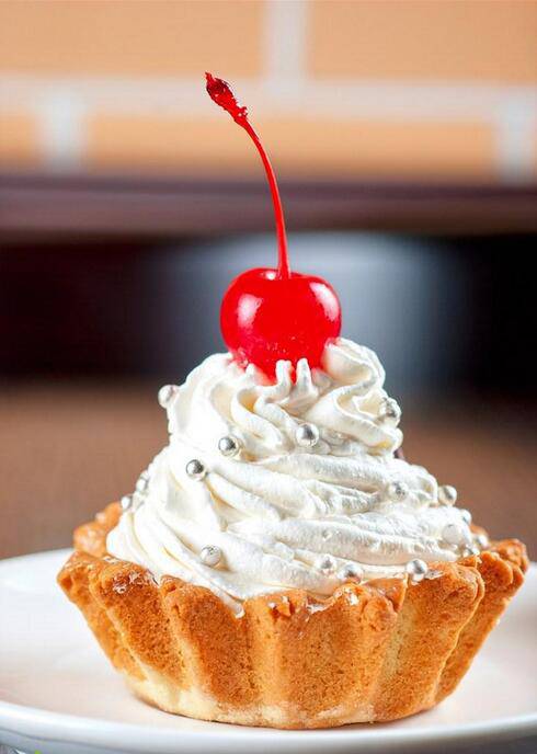 点击大图看下一张：香浓的美味冰淇淋杯子蛋糕