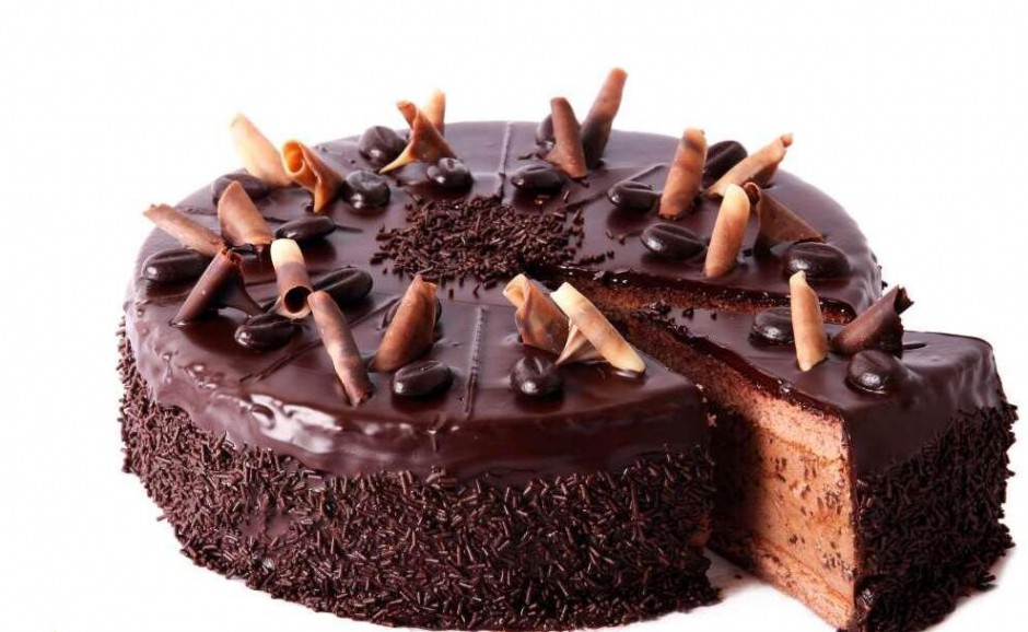 点击大图看下一张：圆形的黑色巧克力蛋糕图片