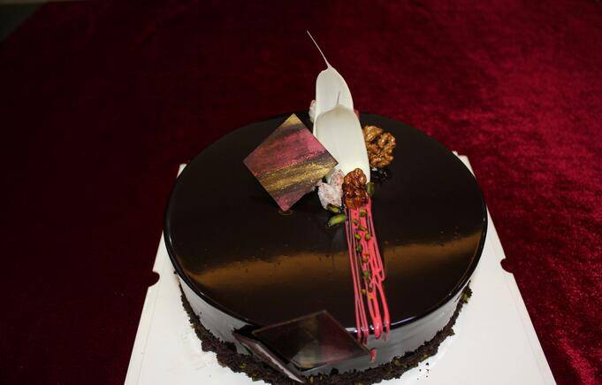 点击大图看下一张：自制黑巧克力蛋糕图片