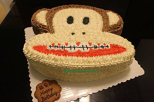 点击大图看下一张：大嘴猴卡通生日蛋糕图片