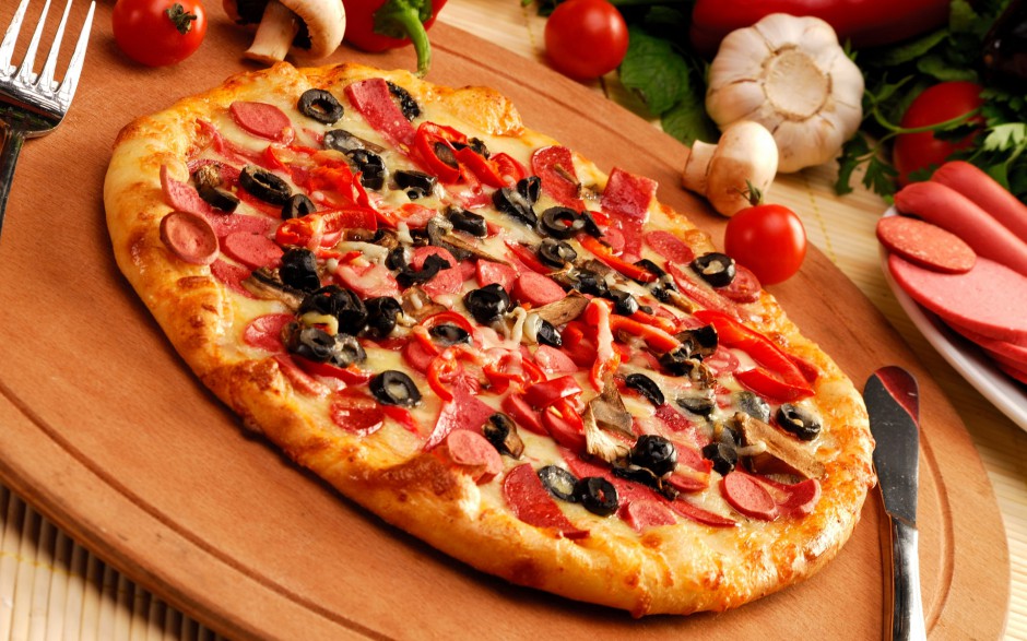 点击大图看下一张：意大利披萨图片风味浓郁