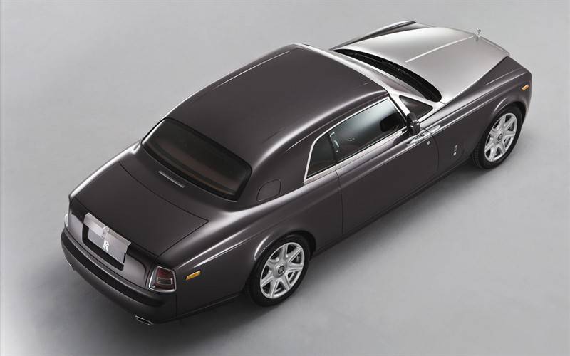 点击大图看下一张：劳斯莱斯黑色奢华轿车图片