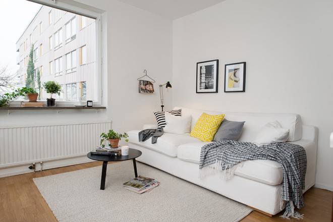 点击大图看下一张：小型公寓白色简约装修效果图舒适温馨