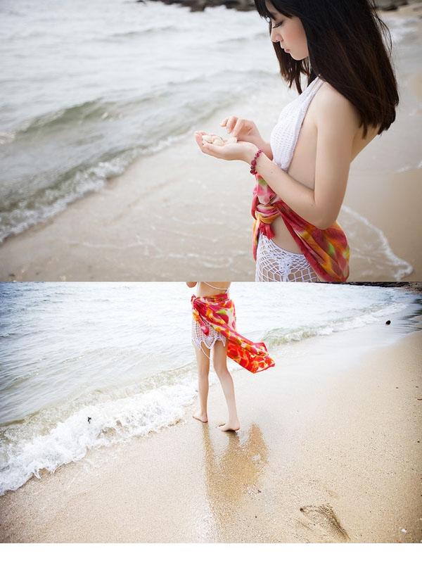 点击大图看下一张：嫩模纯白镂空的海滩之恋6