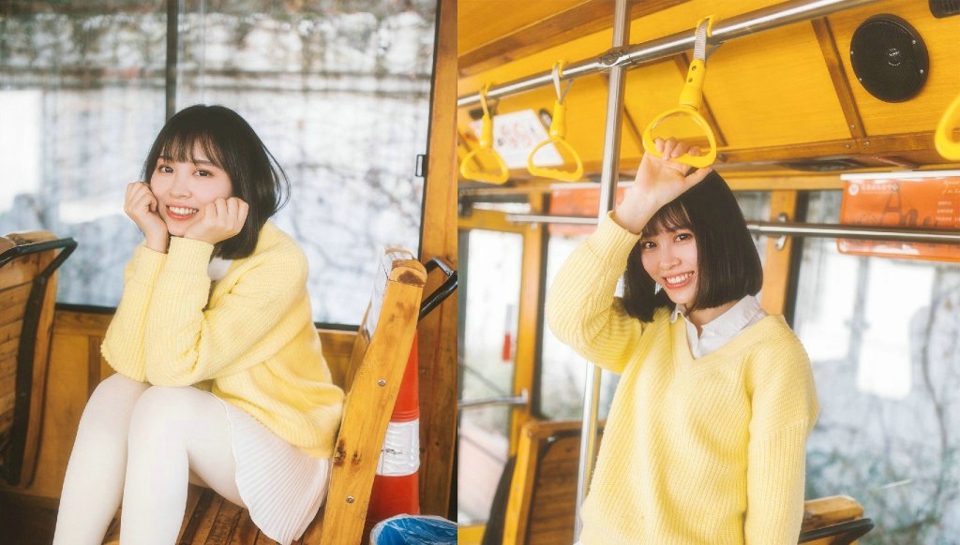点击大图看下一张：巴士上的暖黄毛衣笑容灿烂惹人爱