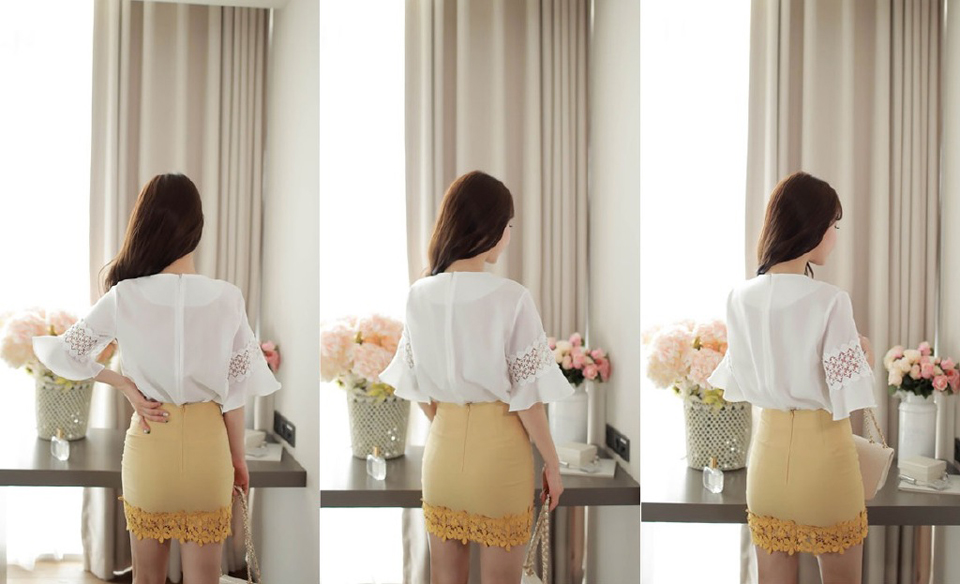 点击大图看下一张：黄色包臀短裙美艳模特优雅迷人