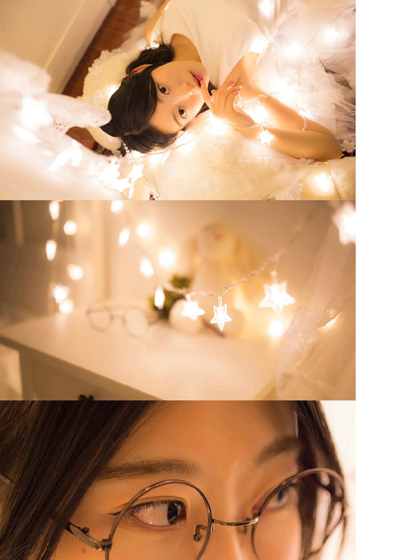 点击大图看下一张:灯光舒适眼镜少女文静柔美写真