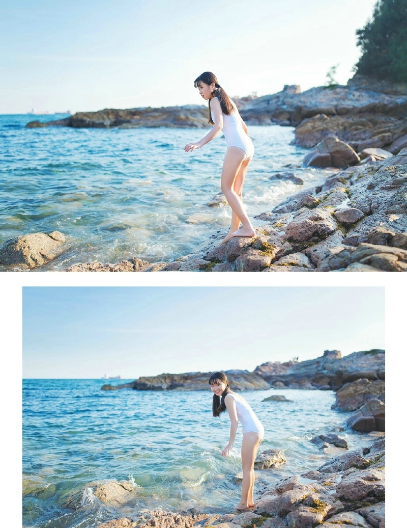 点击大图看下一张：海岸边的泳装少女双马尾青春靓丽