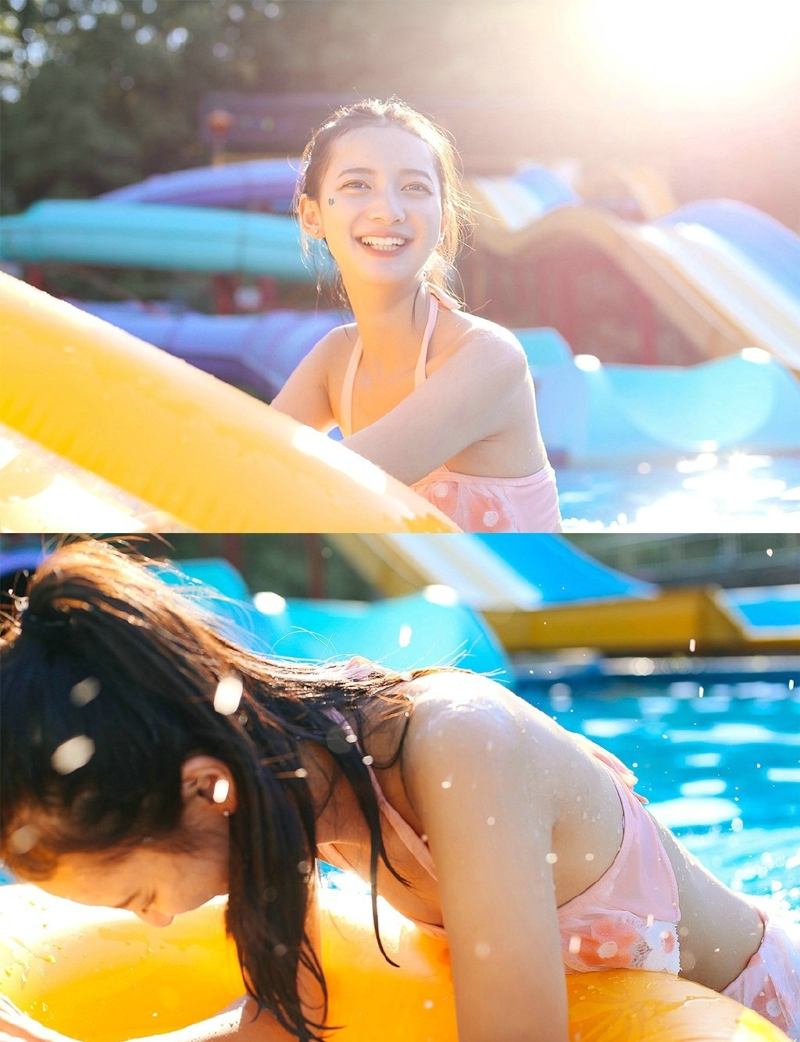 点击大图看下一张：泳池内的阳光美少女笑脸娇美可人
