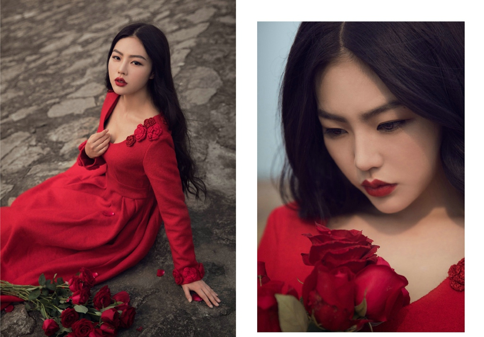 点击大图看下一张：户外红裙艳丽美女中分黑发玫瑰花香