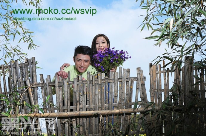 点击大图看下一张：油菜花 婚纱摄影