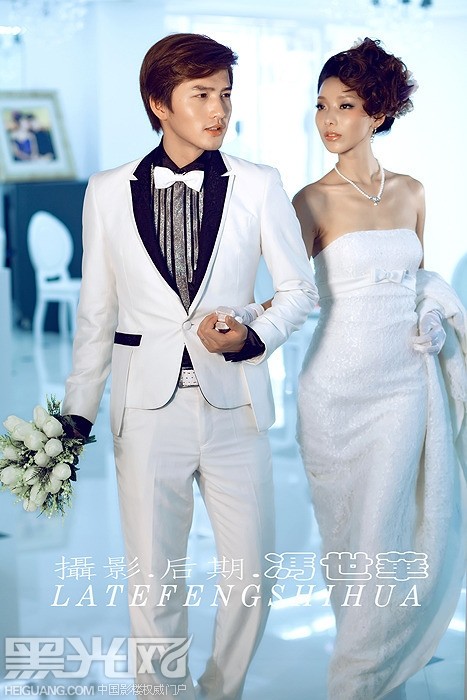 点击大图看下一张：白色浪漫 婚纱摄影