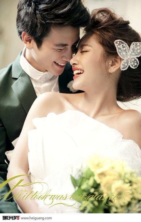 点击大图看下一张：花的嫁纱 婚纱摄影