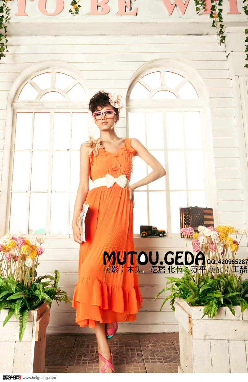 点击大图看下一张：阳光橘 婚纱摄影