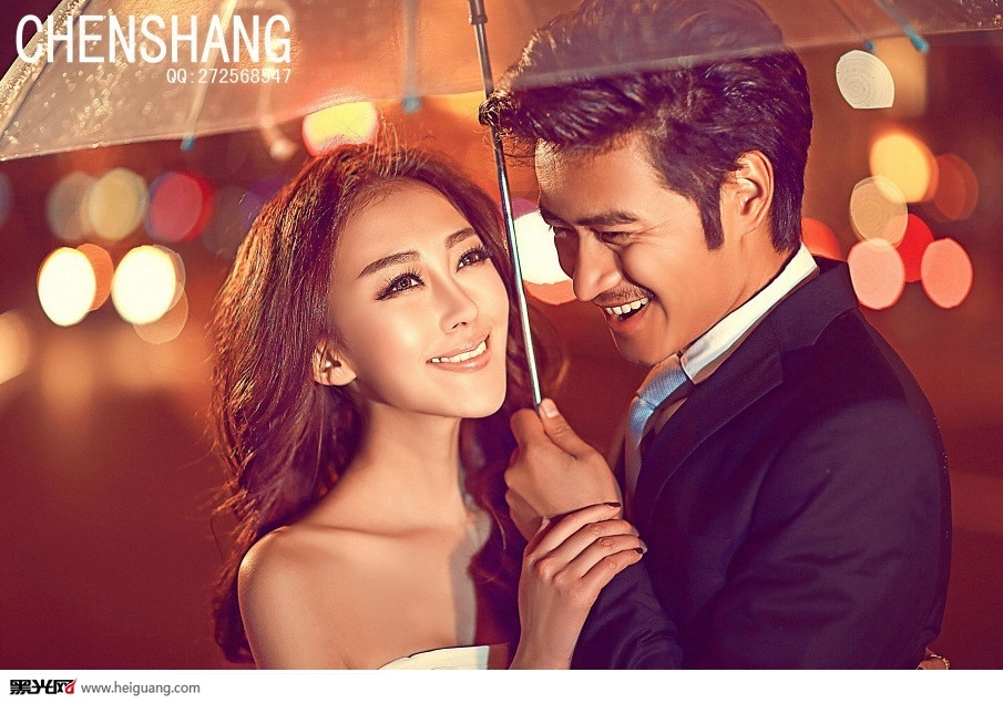 点击大图看下一张：雨中 婚纱摄影