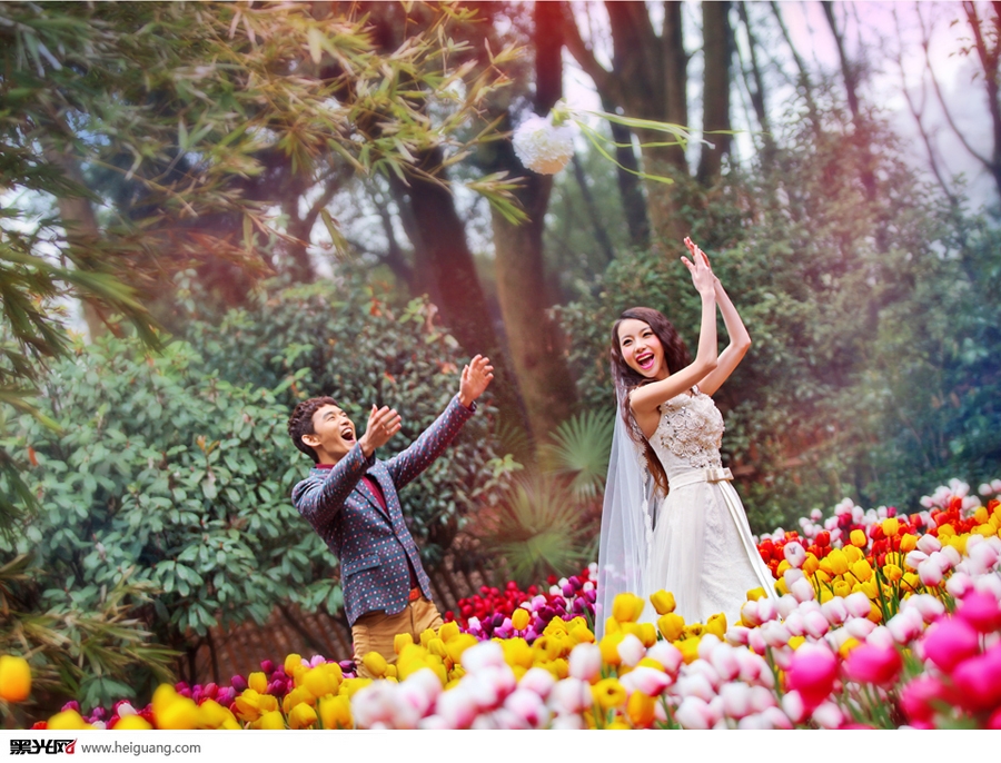 点击大图看下一张：郁金香花海 婚纱摄影