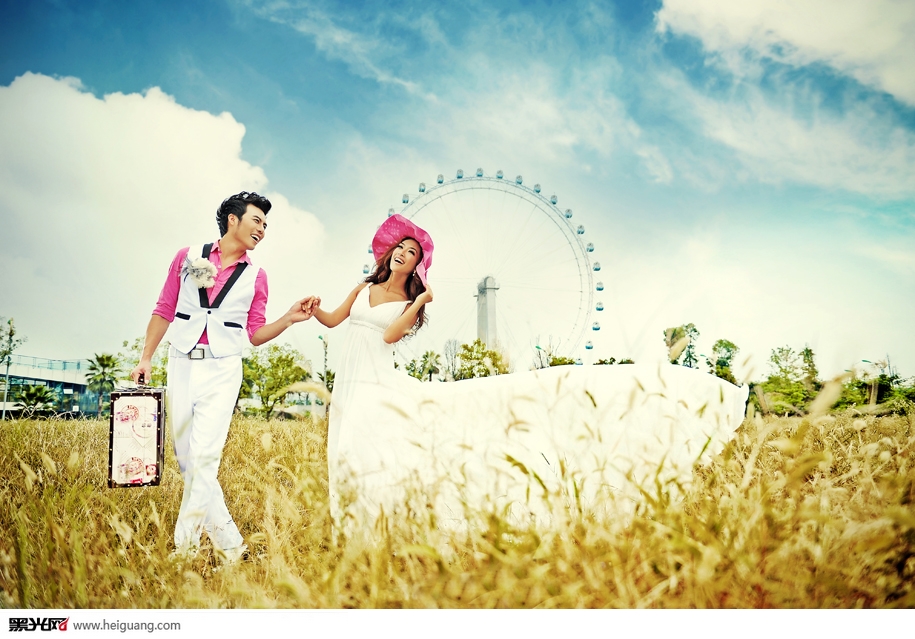 点击大图看下一张：相约摩天轮 婚纱摄影