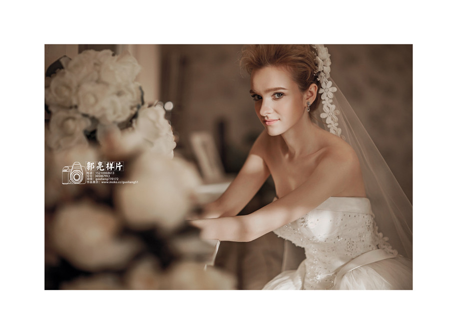 点击大图看下一张：甜蜜的微笑 婚纱摄影