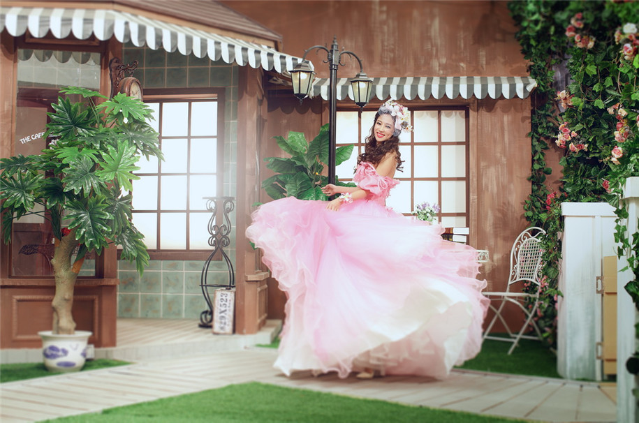 点击大图看下一张：花仙子 婚纱摄影