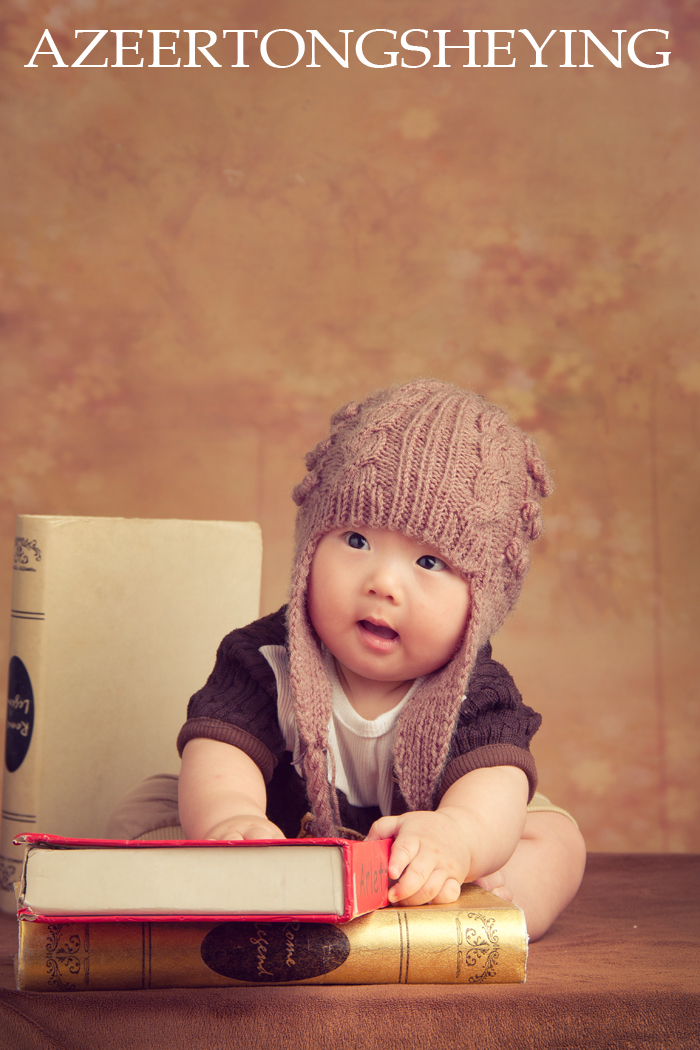 点击大图看下一张：爱学习的小BABY 儿童摄影