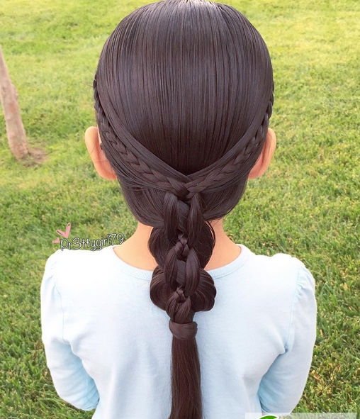 点击大图看下一张:小女孩舞蹈表演编发图片