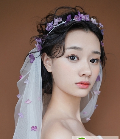 点击大图看下一张：唯美仙气新娘发型设计