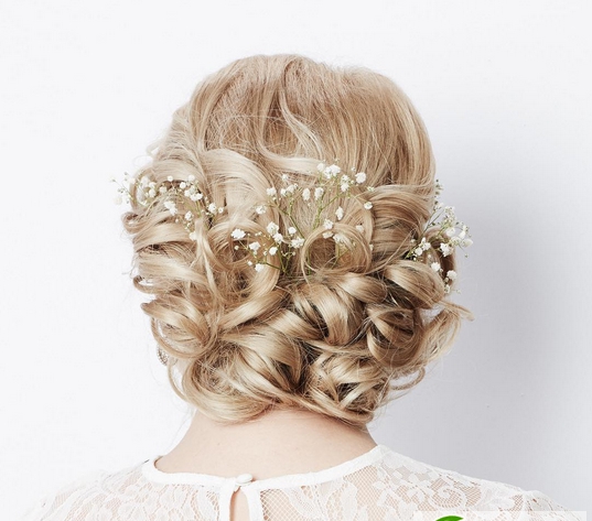 点击大图看下一张：欧式新娘婚礼时尚发型 2017新娘鲜花皇冠发型