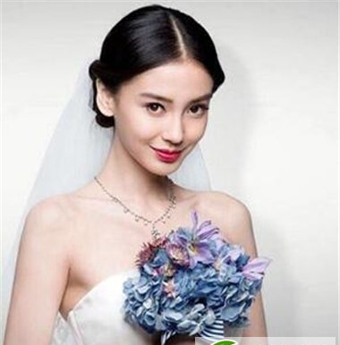 点击大图看下一张:圆脸女士适合的新娘发型