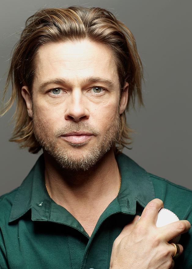 点击大图看下一张：布拉德-皮特拍运动写真