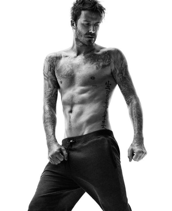 点击大图看下一张：贝克汉姆登内衣广告 肌肉映纹身狂野性感