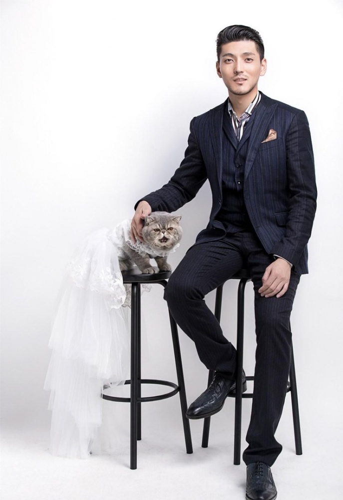 点击大图看下一张:隋咏良七夕变爱宠情人 喵星写真萌翻众人