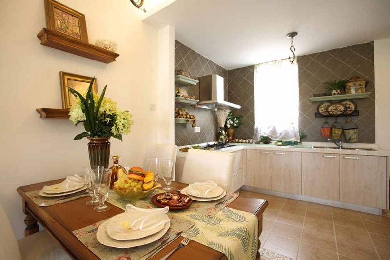 点击大图看下一张：清新绿意田园风三居室装修设计欣赏