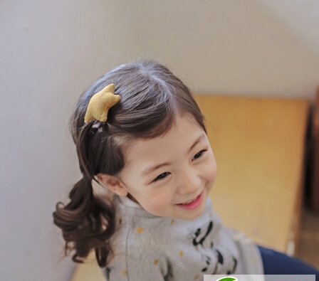 点击大图看下一张：每天帮女儿换一个发型