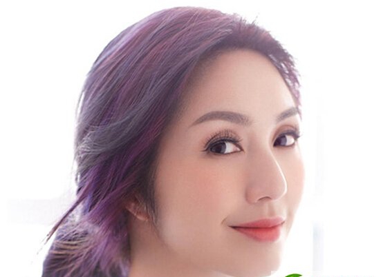 点击大图看下一张：细数歌后杨千嬅经典发型 款款美爆眼球