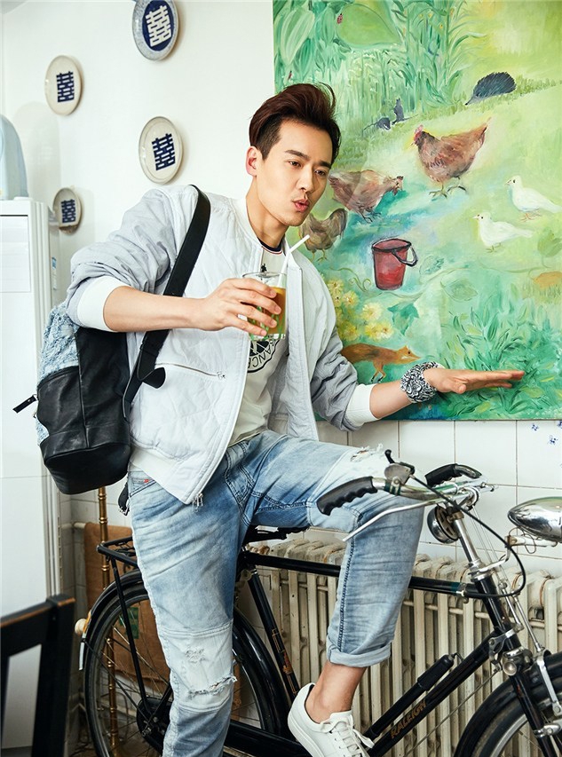 点击大图看下一张：成熟帅哥高云翔与你共饮下午茶阳光写真