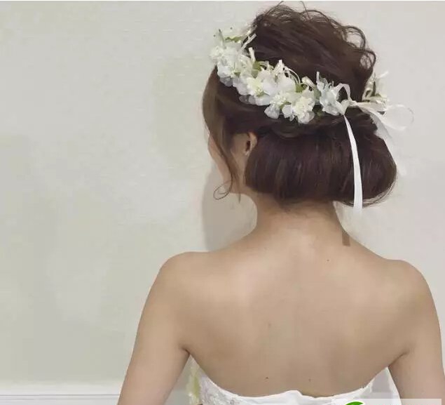 点击大图看下一张：韩式新娘发型设计　时尚新娘发型图片