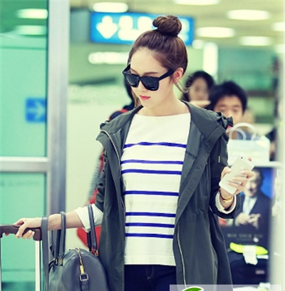 点击大图看下一张：丸子头怎么弄好看 选对扎发颜值加分