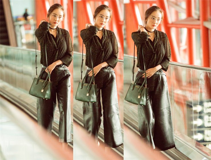 点击大图看下一张：杨幂启程纽约时装周