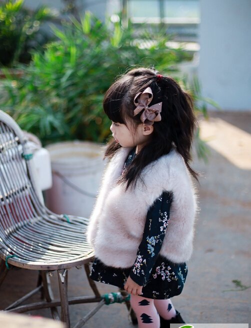 点击大图看下一张：时尚萌娃穿搭发型搭配